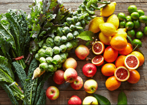 a group of fruits and vegetables on a wood surface Healthy Weight Loss Diets Southsea