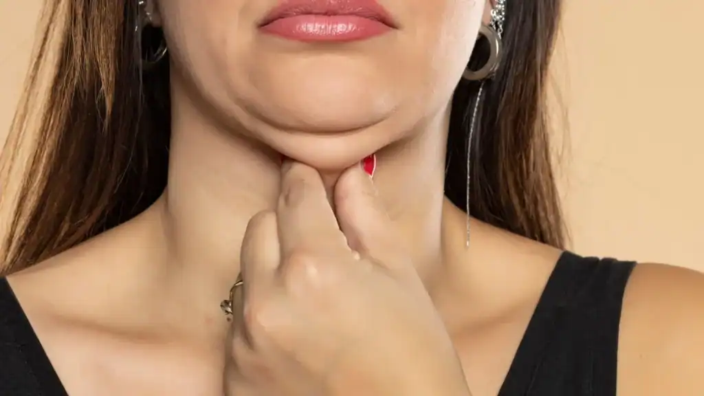 An image of a woman with double chin, sad, worried : Non Surgical Double Chin Removal Treatment in Southsea, UK